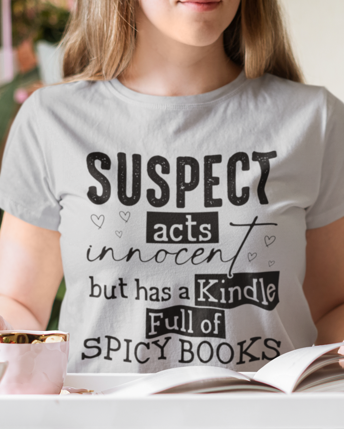 Suspect Acts Innocent But Has a Kindle Full of Spicy Books T-Shirt